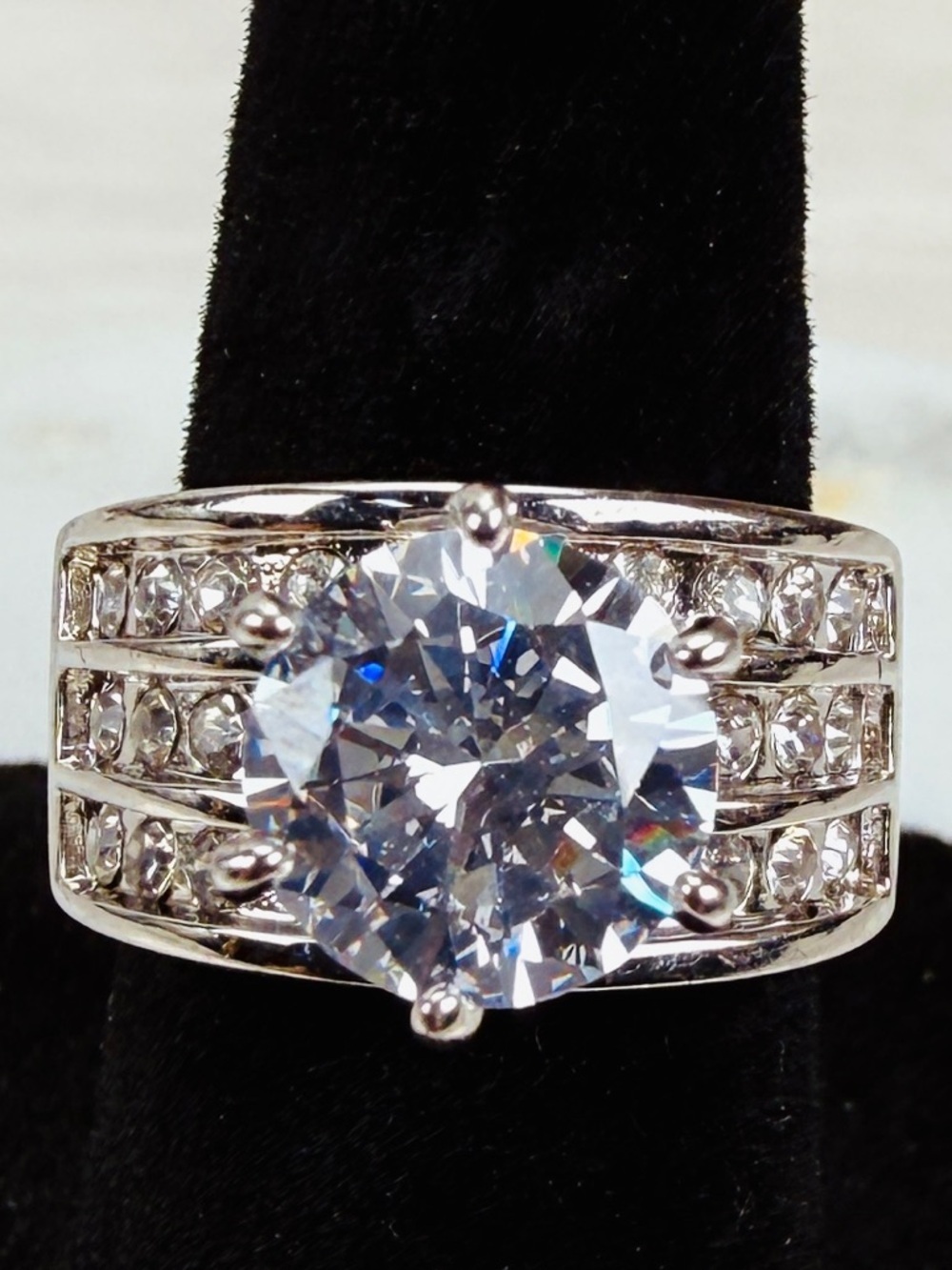 Elegant Silvertone sz 4 3/4 Ultra Bling wedding band ring